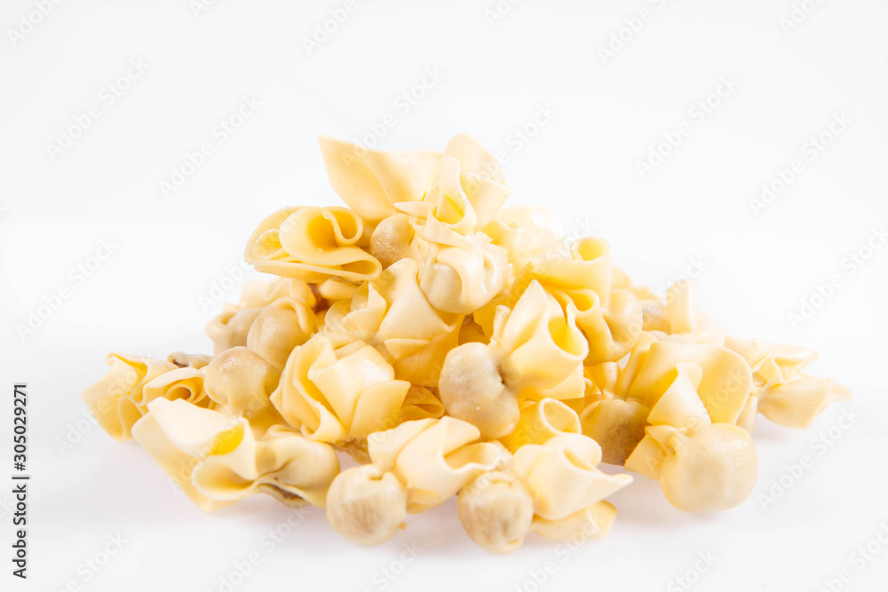 Sacchettini pasta on a white background