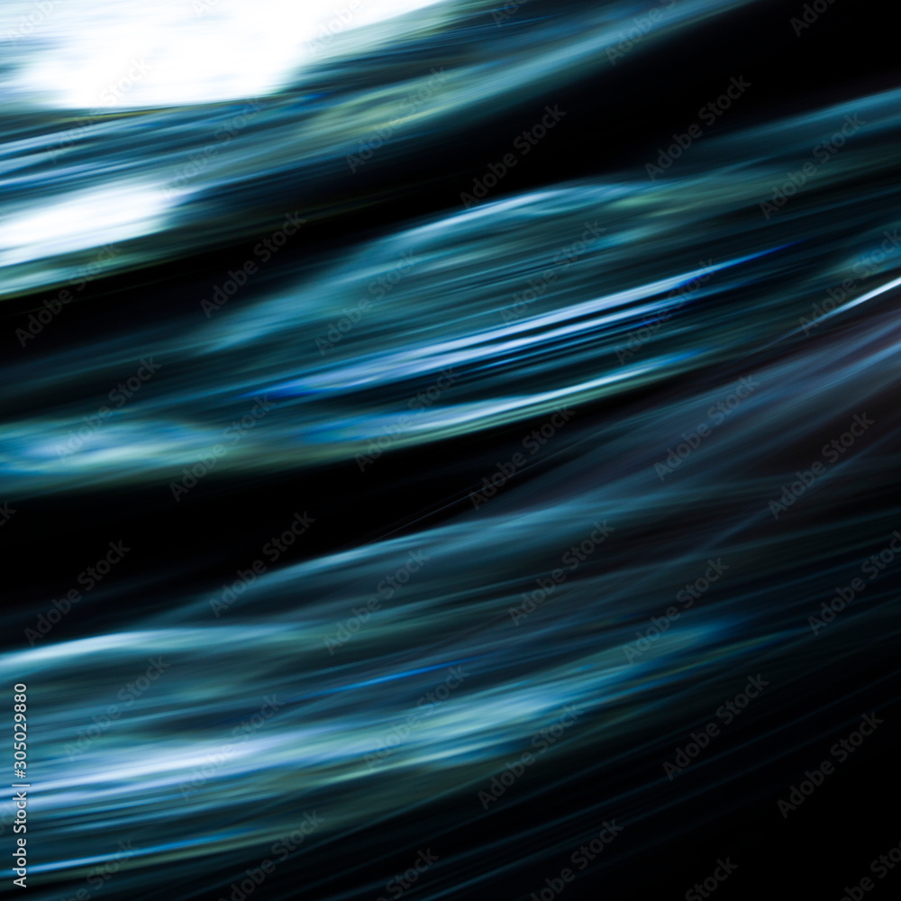 Blue light curve lines on a black background . Blue light curve lines on a black background .