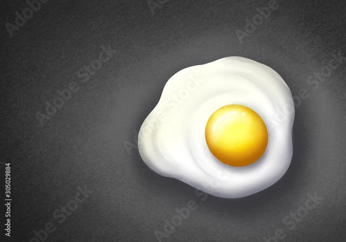 Fried egg on black background with copy space.Eggs are made easy and delicious.