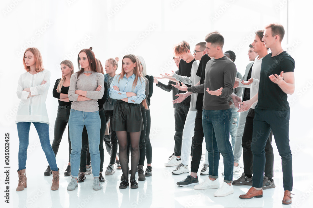 Obraz premium groups of young men and women standing separately