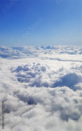 landscape above the clouds from airplane © sebi_2569