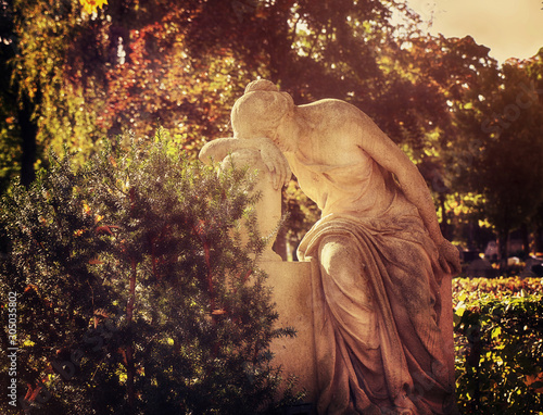 Photos Funerary neo-classical monument: tearful nymph grieving on a grave