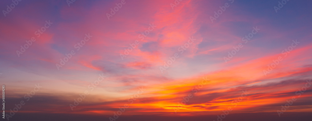 Beautiful background sunrise or sunrise sky with sunbeam over the sea. Copy space and banner composition.