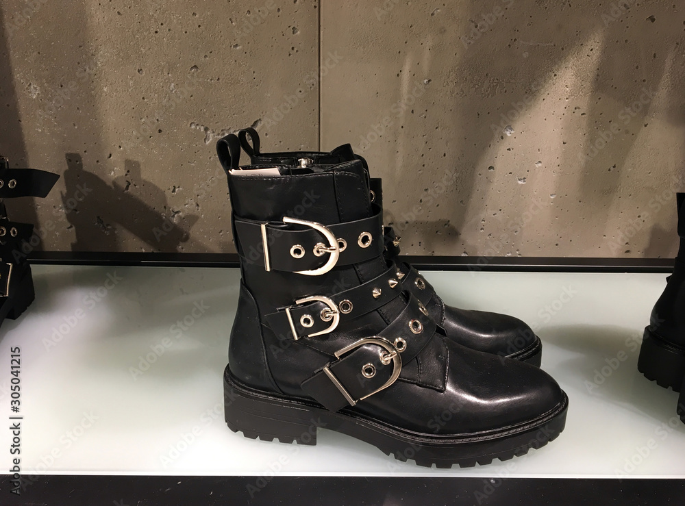 Black flat ankle boots with buckle 