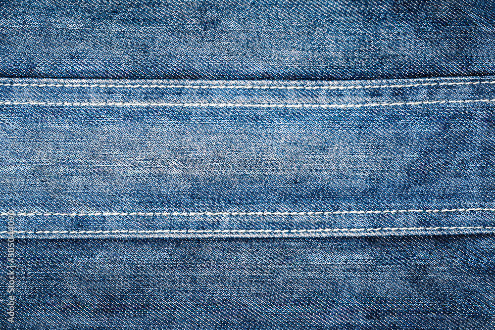 Perspective and closeup view to abstract space of empty light blue natural clean denim texture for the traditional business background in cold bright colors . Perspective and closeup view to abstract space of empty light blue natural clean denim texture for the traditional business background in cold bright colors .