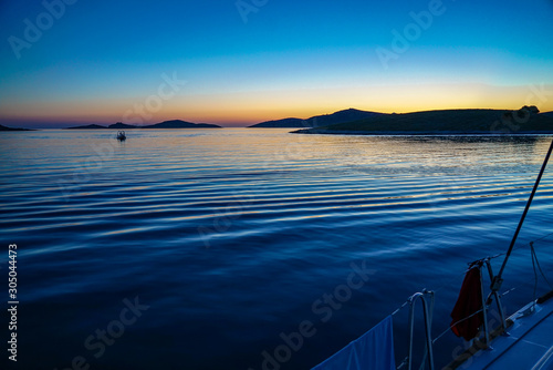 Tramonto in mare  sul catamarano  photo