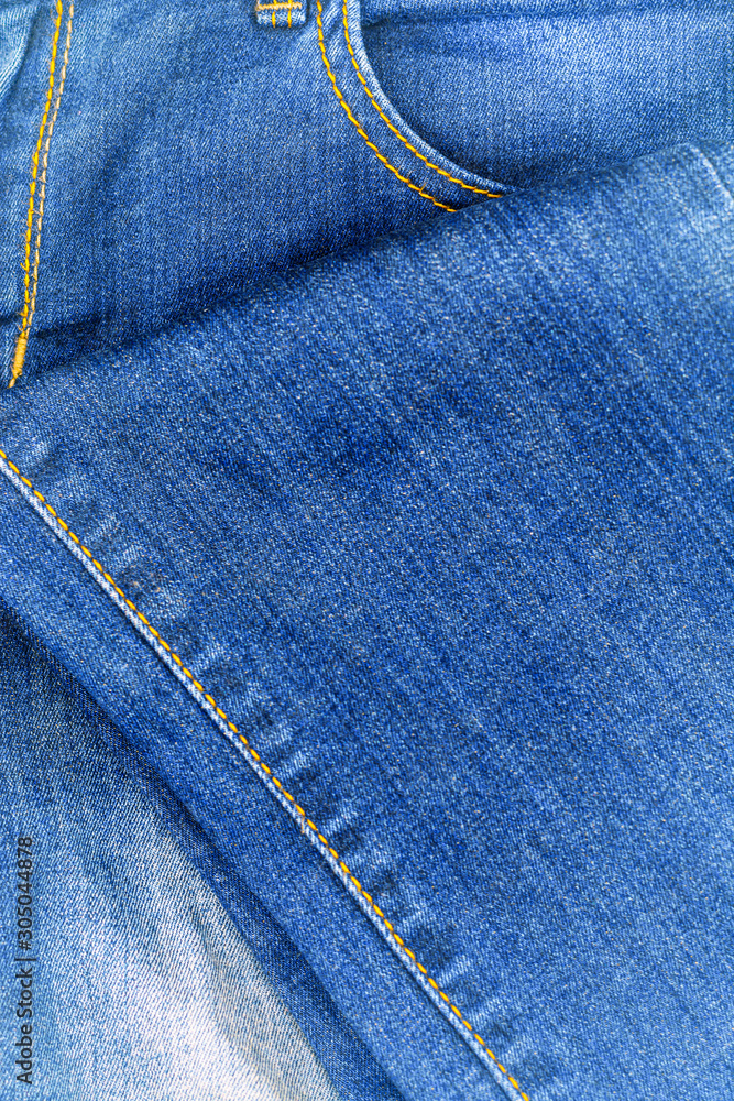 Perspective and closeup view to abstract space of empty light blue natural clean denim texture for the traditional business background in cold bright colors . Perspective and closeup view to abstract space of empty light blue natural clean denim texture for the traditional business background in cold bright colors .