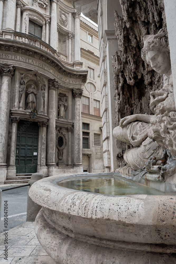 Rome, Italy, The fountain on the corner of the house on one of the streets of Rome