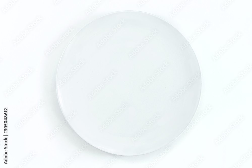 Empty plate on dark stone background. Empty plate on dark stone background.