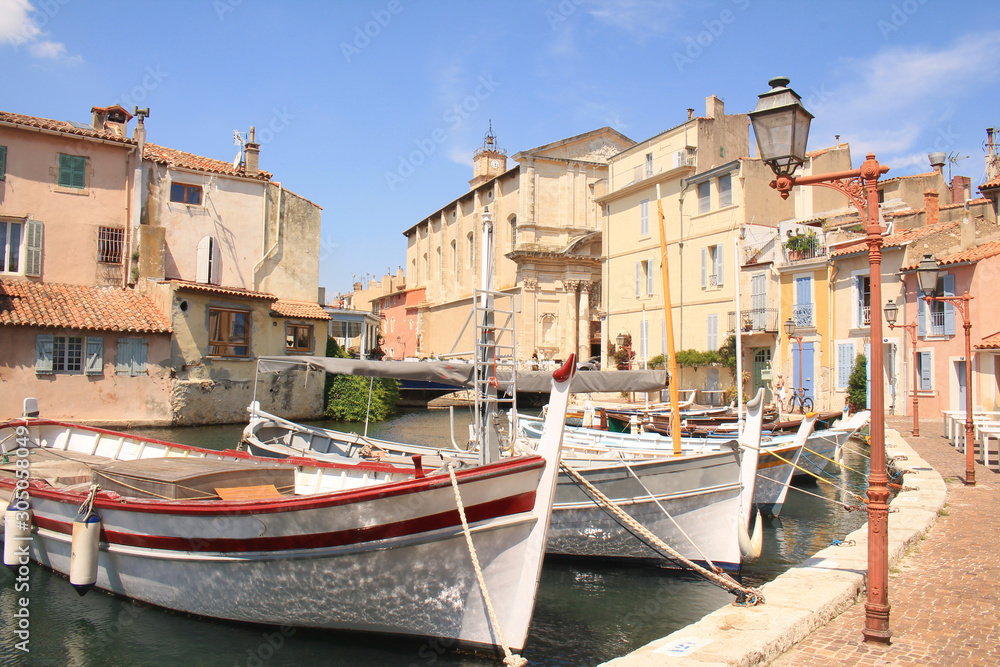 The old harbor of Martigues with traditional wooden boat. Martigues, called the Little Venice of Provence, France