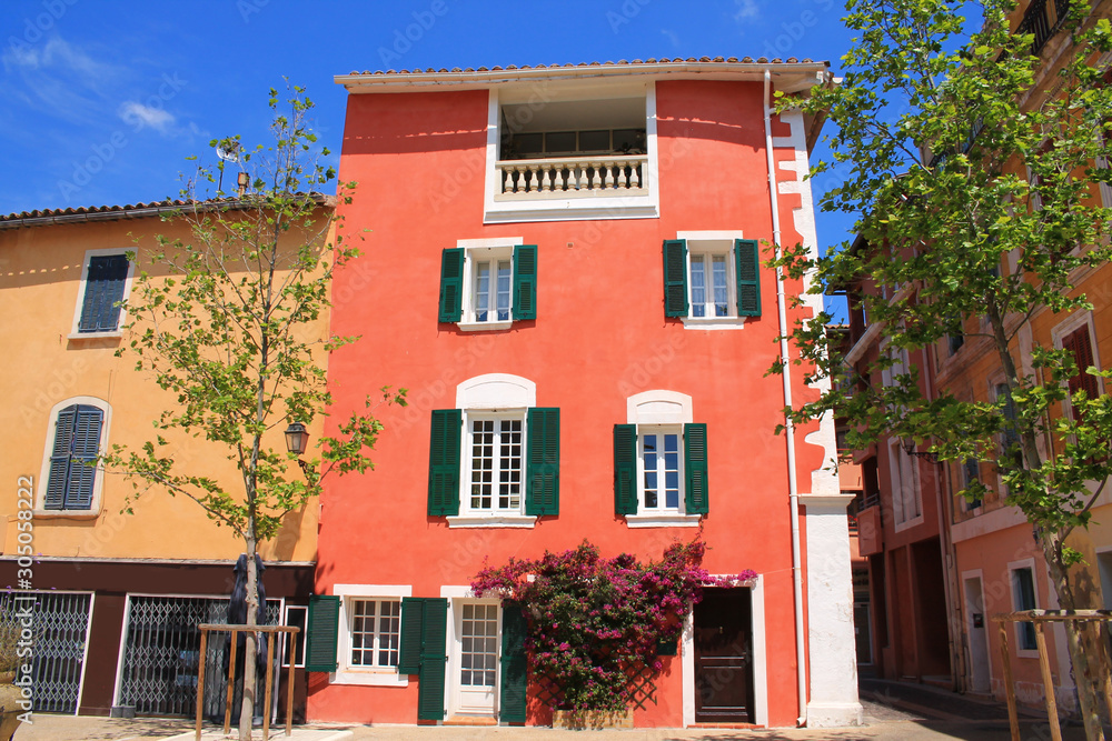 Traditional houses with colorful facades and wooden window shutters in the historic center of Martigues, the Little Venice of Provence, France 