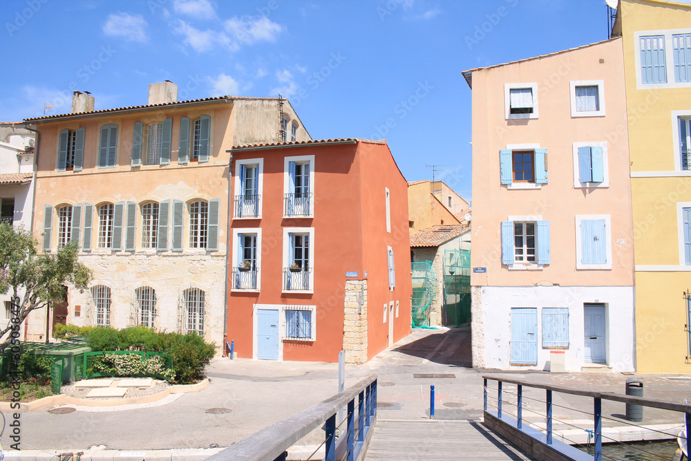 Traditional houses with colorful facades and wooden window shutters in the historic center of Martigues, the Little Venice of Provence, France 
