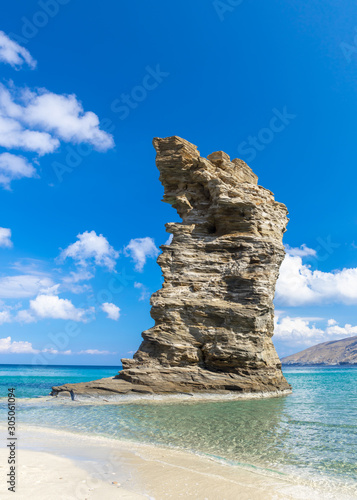 Fototapeta Naklejka Na Ścianę i Meble -  Photo of iconic beach of Grias Pidima near village of Korthi, with rare geological rock and turquoise clear waters, Andros island, Cyclades, Greece