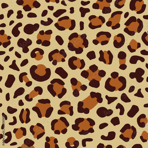 Vector abstract seamless bright animalistic leopard pattern with brown colored stains elements on the beige background