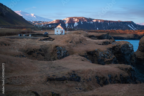 House under Snaefellsjokull volcano in Snaefellsnes Peninsula iceland