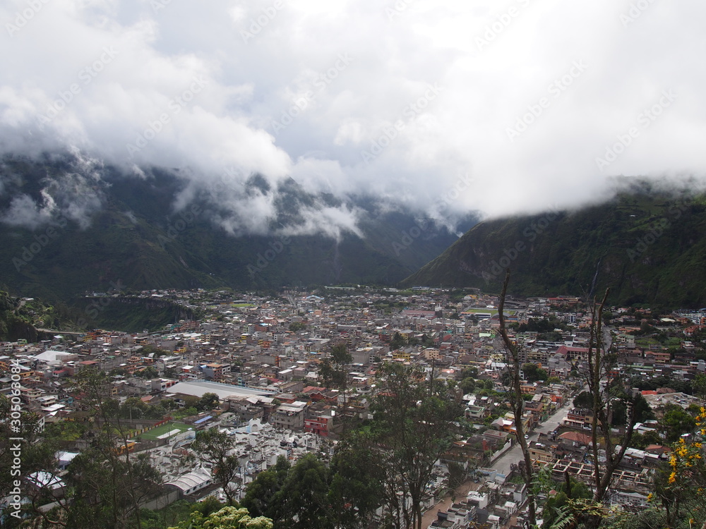 Cloudy sky and view of the city, Banos (Baños), Ecuador