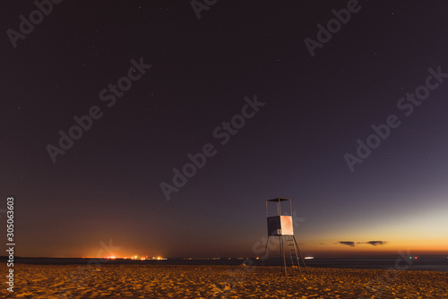 Wooden breakwater at sunset on the Baltic Sea