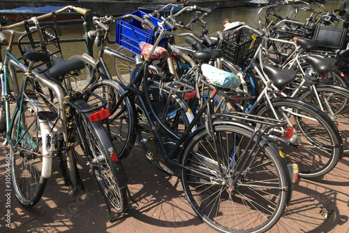 Bicycle Parking on the waterfront, Amsterdam, Netherlands, concept of ecology and healthy lifestyle