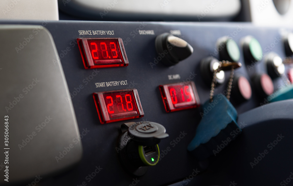 Controls and indicators on yacht dashboard.