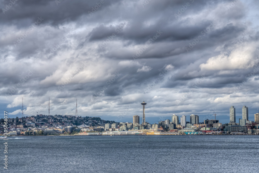 Naklejka premium Dark Clouds Over City