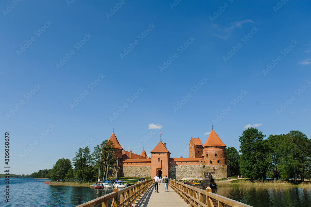 Old Trakai castle in sunny day. Trakai, Lithuania, Galve lake. Old Trakai castle in sunny day. Trakai, Lithuania, Galve lake.