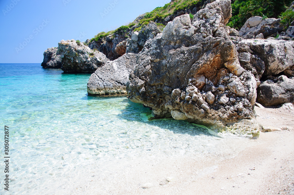 Calampiso Beach, in Trapani Province, Sicily . The beach is located between San Vito Lo Capo and Castellammare del Golfo, near the Zingaro Reserve. 