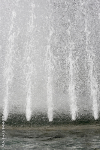 City fountaine and water splash  photo