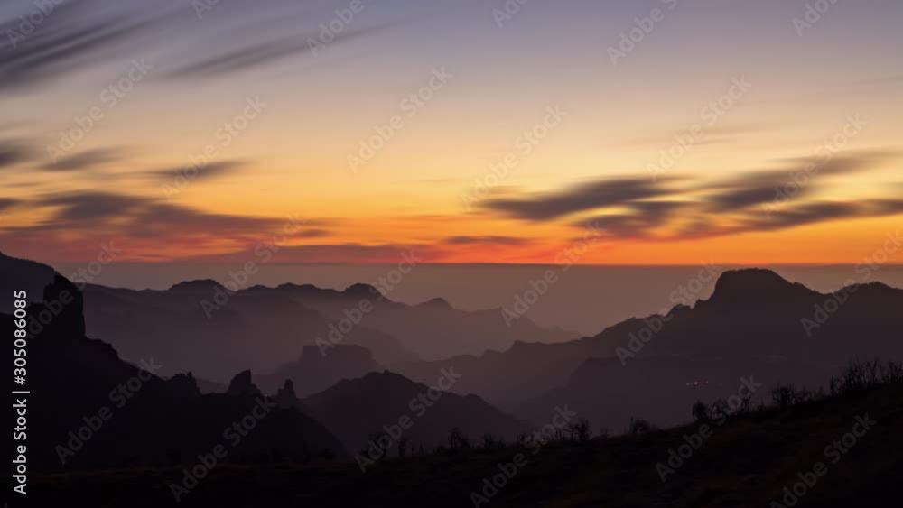 Day to night long exposure sunset time lapse over volcanic caldera of Tejeda, Gran Canaria, Canary islands, Spain. Day to night long exposure sunset time lapse over volcanic caldera of Tejeda, Gran Canaria, Canary islands, Spain.