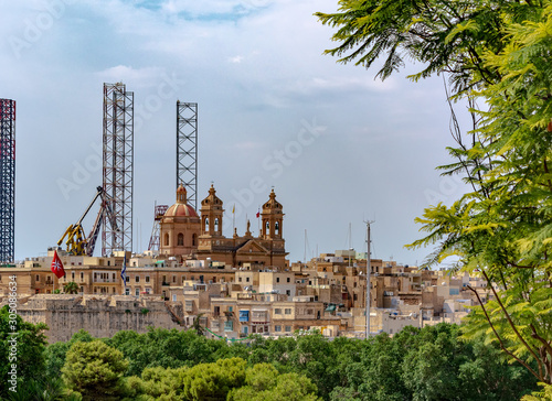 View to the Basilica of the Nativity of Mary in Senglea from Bormla garden. The church was destroyed by bombs in 1941, but was rebuilt and consecrated in 1956.