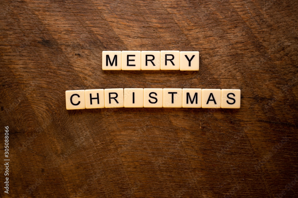 Obraz premium Merry Christmas on wood