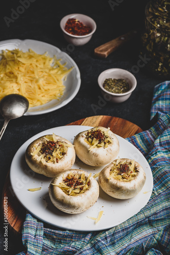 Button mushrooms stuffed with cheese and spices