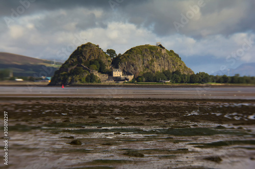 Dumbarton Castle by the river Clyde in Scotland on a sunny summers day