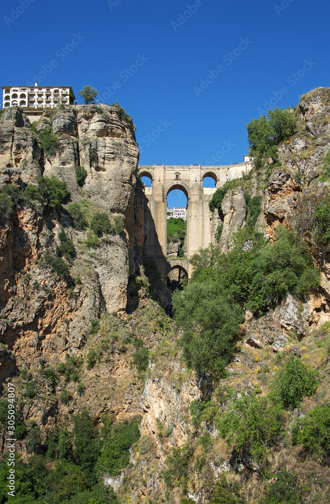 Ponte Nuevo (the New Bridge) in Ronda, Spain. This bridge spans the 120-metre-deep (390 ft) chasm that carries the Guadalevín River and divides the city of Ronda