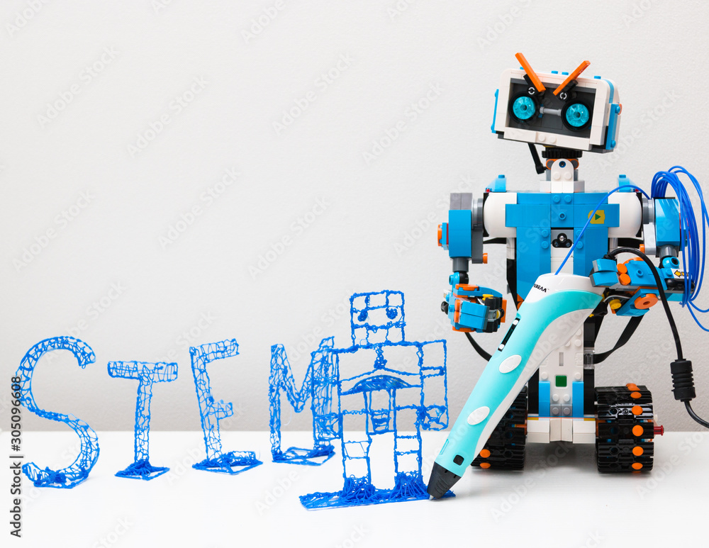 October, 2017. Minsk, Bularus. The schoolboy and the robot Lego Boost. STEM  education. STEAM. Robotics. Stock Photo | Adobe Stock