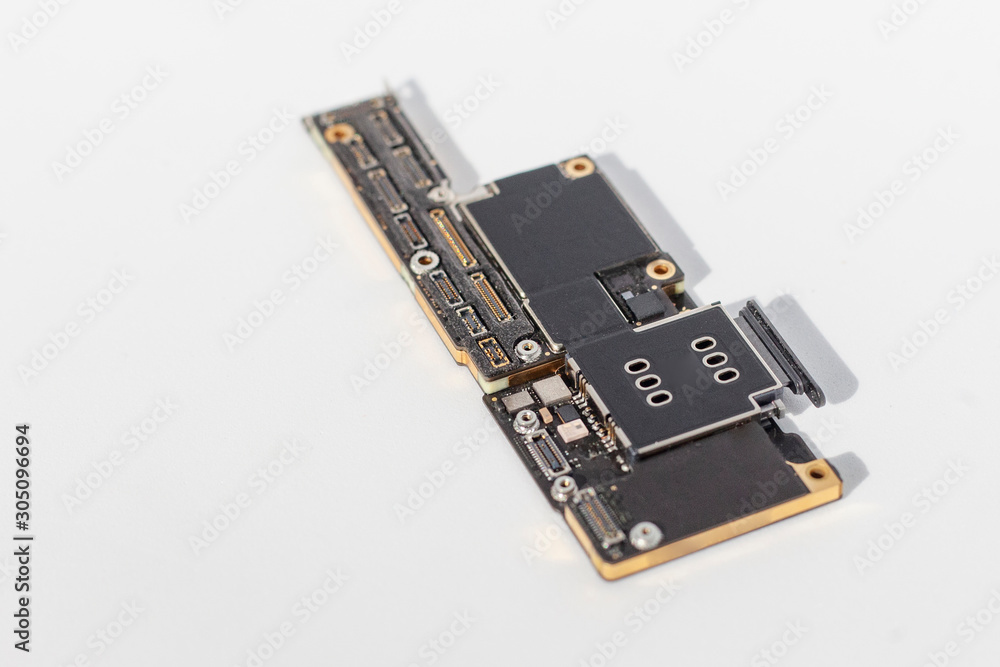 The disassembled phone is waiting for repair. Isolated from the background. The disassembled phone is waiting for repair. Isolated from the background.