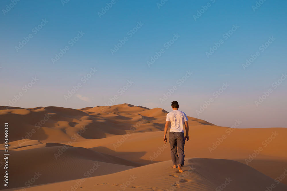 UAE. Man in desert