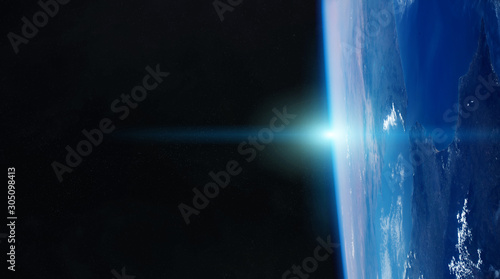 Fototapeta Naklejka Na Ścianę i Meble -  View of planet Earth close up with atmosphere during a sunrise 3D rendering elements of this image furnished by NASA