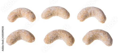 Vanilla crescent roll sweets. Set of fragrant baked pastries isolated on white background. Close-up of traditional Czech Christmas and wedding nutty cookies in shape of rolls dusted with icing sugar.