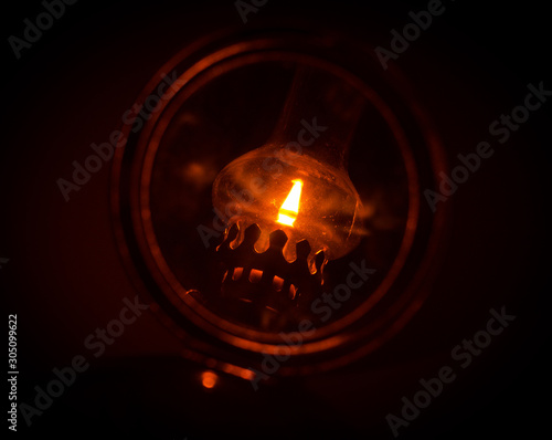 burning flame in the mirror on a black background
