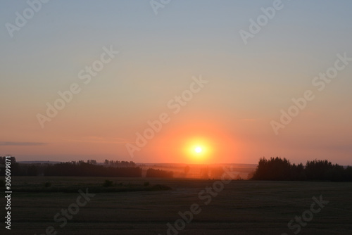 sunset over field © Yaroslav