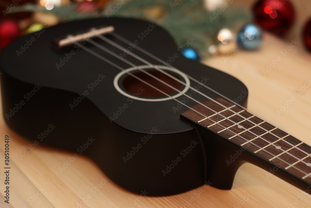 Fototapeta premium black ukulele close up