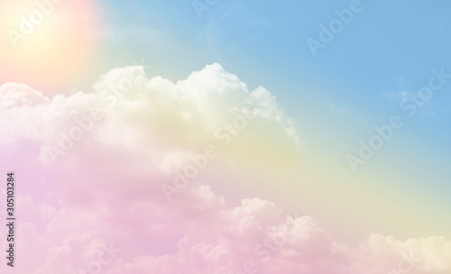 Pastel gradient blurred sky with sun, A soft cloud for background. © Janthana