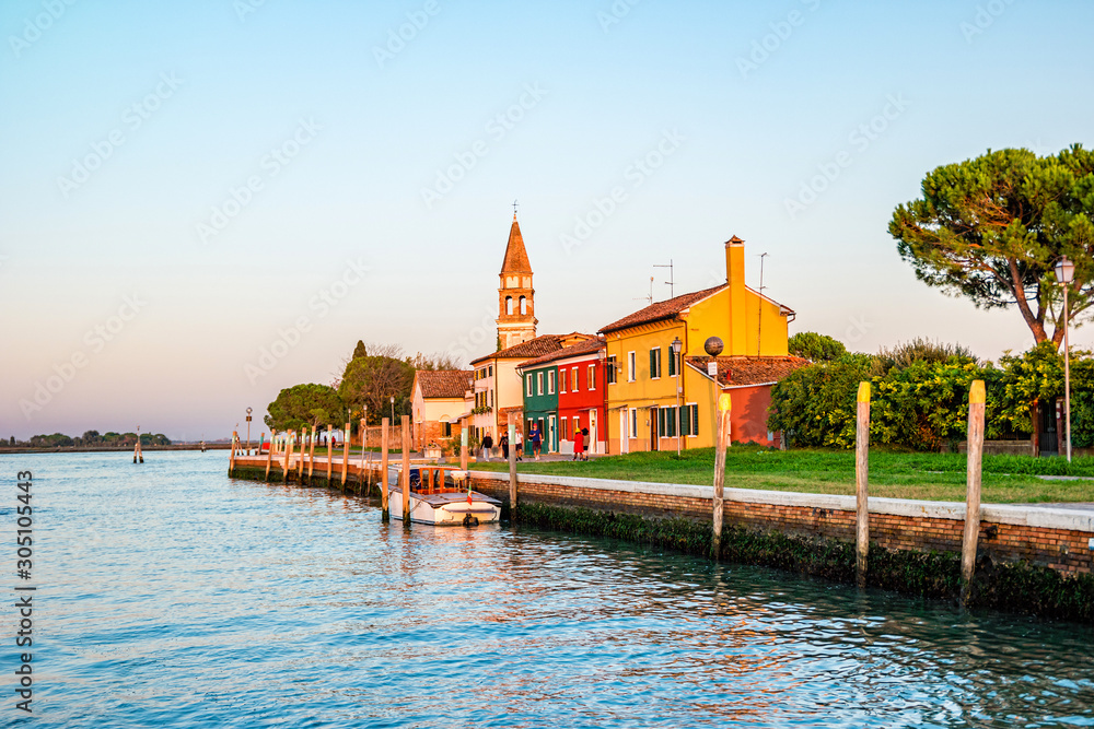 Colorful houses at sunset on the small island Mazzorbo in the northern Venetian Lagoon
