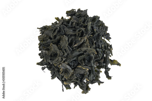 heap of Dried kombu seaweed  isolated on white background. top view. spices and food ingredients