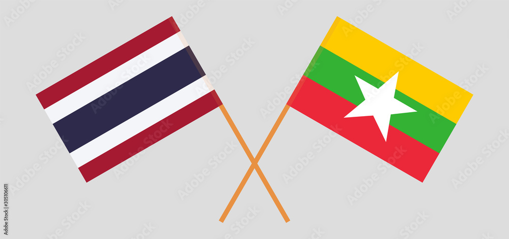 Crossed flags of Myanmar and Thailand