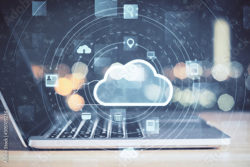 Laptop with cloud computing diagram photo