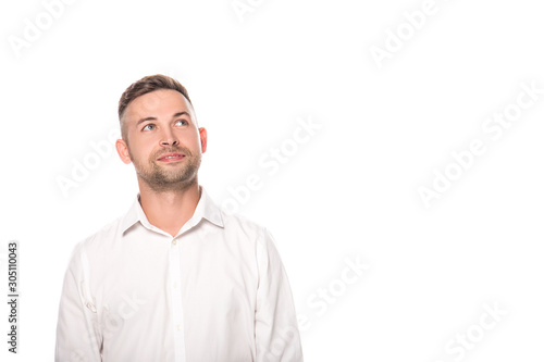 dreamy businessman looking up isolated on white