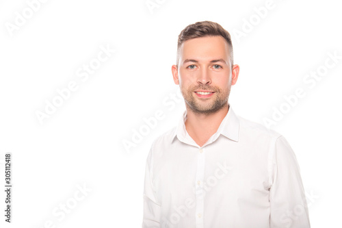young smiling businessman isolated on white with copy space © Igor