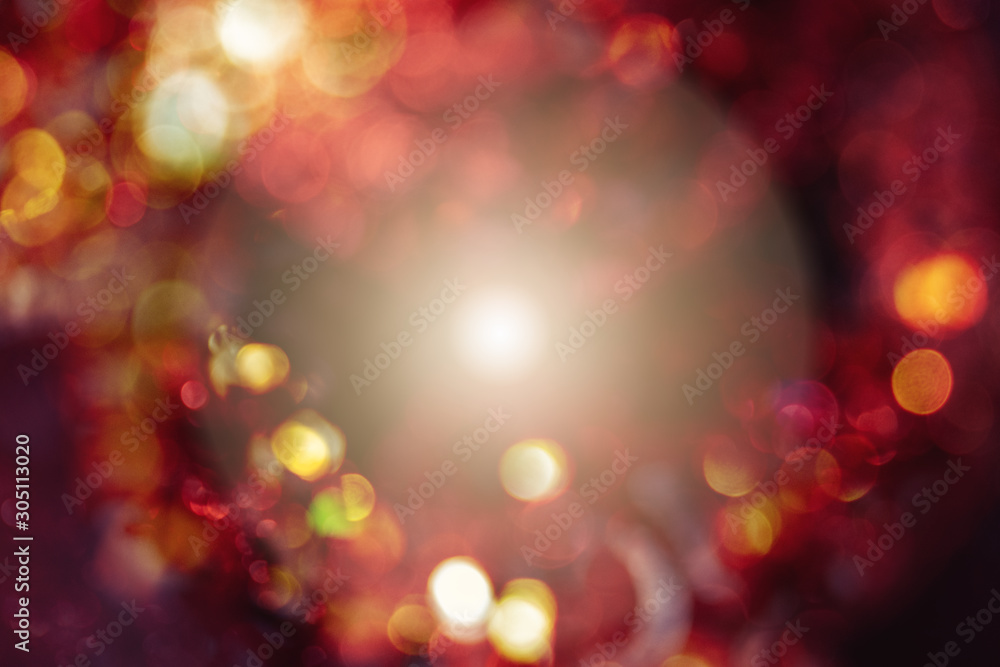 Festive red background bokeh of glare Festive red background bokeh of glare