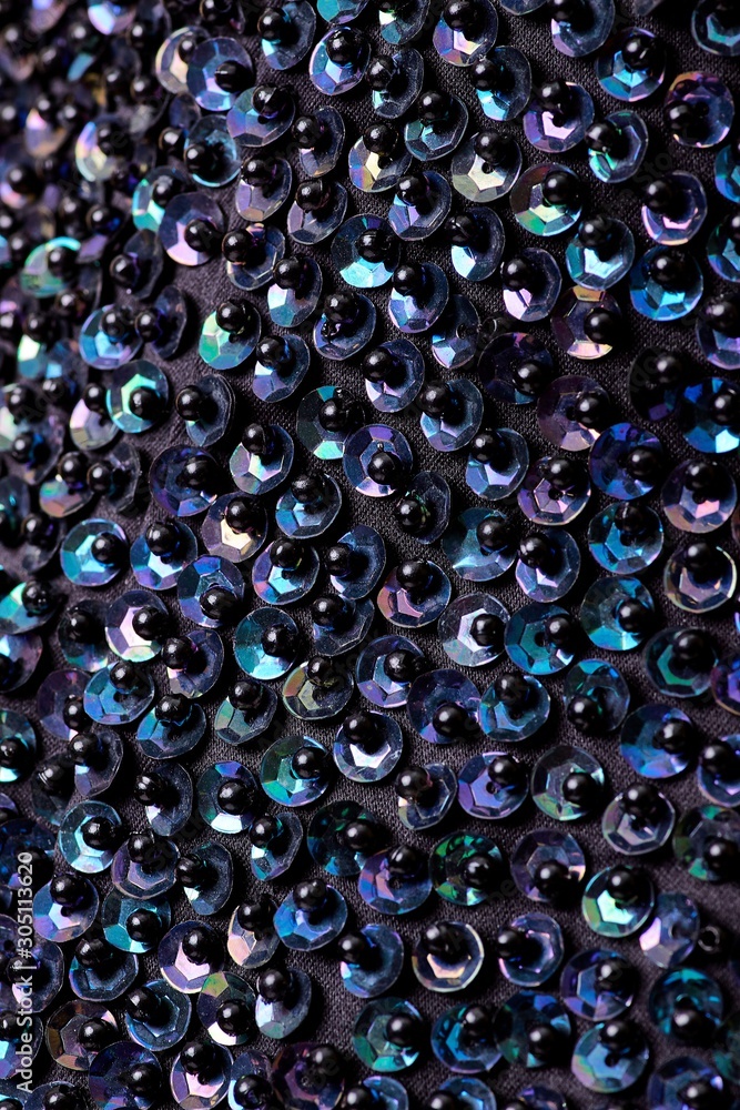 Fabric with sequins and sequins of bright colors. Fashion glitter fabric, sequins. Shiny surface Fabric with sequins and sequins of bright colors. Fashion glitter fabric, sequins. Shiny surface